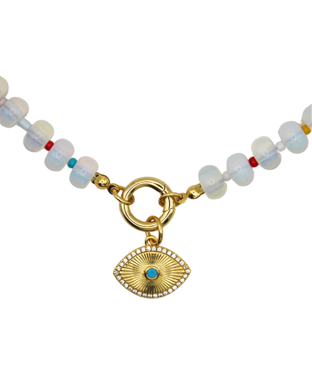 Necklace with white beads and a gold evil eye charm.