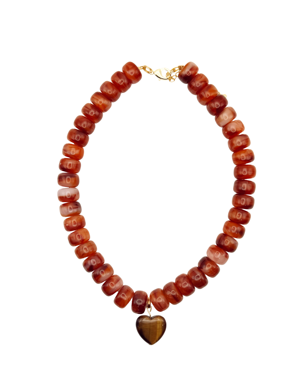 Necklace with red beads and a heart-shaped pendant on a white background